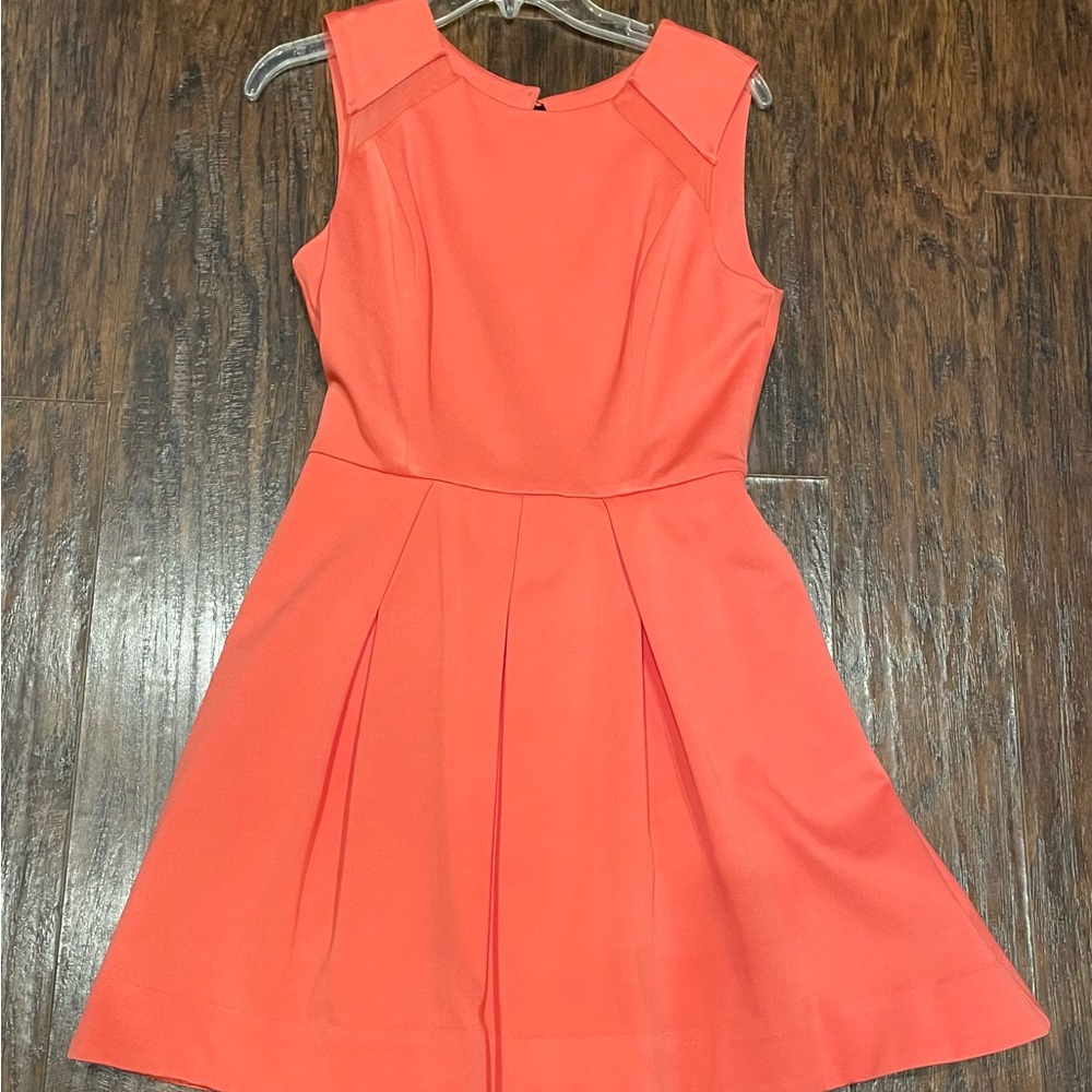 A open back sleeveless Bebe dress